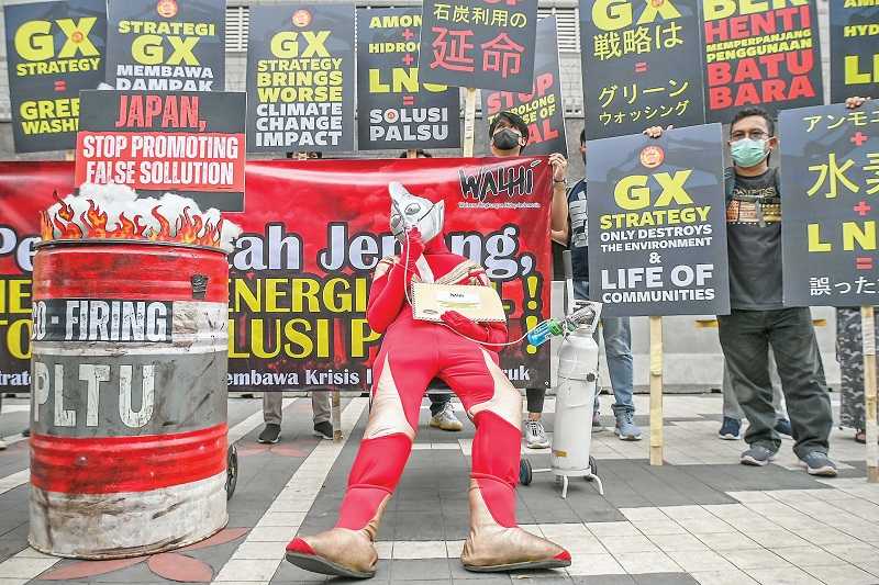 AKTIVIS LINGKUNGAN PROTES SOLUSI PALSU JEPANG ATASI KRISIS IKLIM