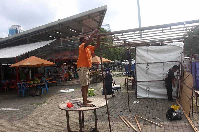 Membangun Kembali Kios