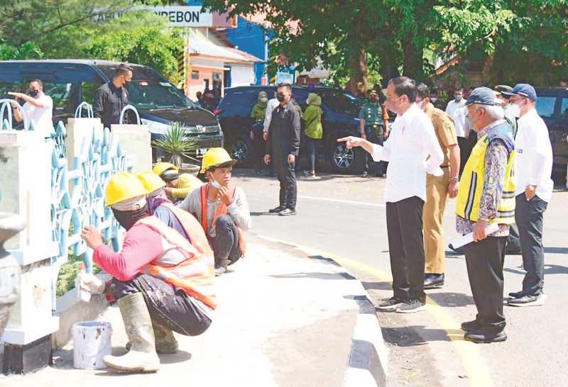 MENINJAU KEGIATAN PADAT KARYA TUNAI
