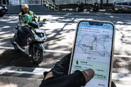 Berita Foto : Kebijakan Pembatasan Komisi Ojek Daring