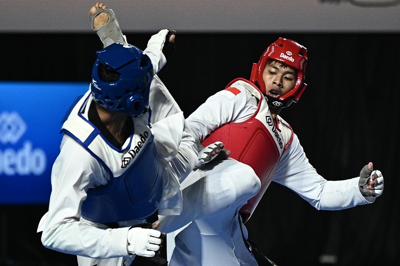 Serda Muhammad Raihan Fadhila Sabet Medali Emas Kyorugi U...