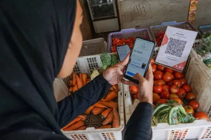 Berita Foto : QRIS Menjangkau 65,77 Juta Pengguna, Mayoritas Merchant Merupakan UMKM