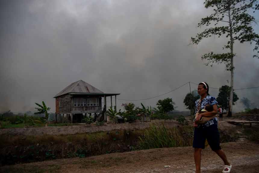 Berita Foto : Kasus ISPA Ditemukan di Tujuh Provinsi Terdampak Karhutla