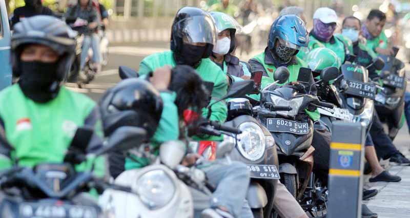 Pemerintah Berencana Terbitkan Perpres Kesejahteraan Ojol, Begini Tanggapan Grab