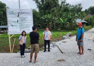 Bantuan Pembangunan Jalan Desa Tempang Dua Minahasa