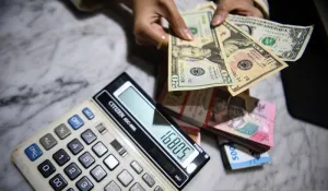 Rupiah Tetap Melemah Dihantam Ketidakpastian Ekonomi dan Geopolitik