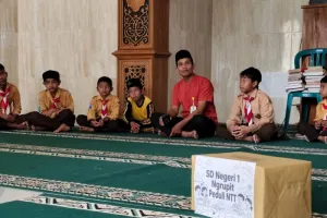 Peduli Korban Gempa NTT, Puluhan Siswa SD di Ponorogo Galang Donasi.