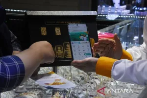 OJK Kaji Batas Bunga Gadai,...