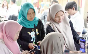 Bebas Antre dan Ongkos, Digitalisasi Bansos Bikin 5,4 Juta KK Kaget Lebih Praktis
