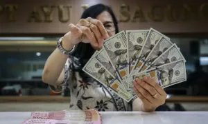 Rupiah Melemah ke Rp18.046 per Dollar AS, Pasar Waspadai Arah Kebijakan The Fed