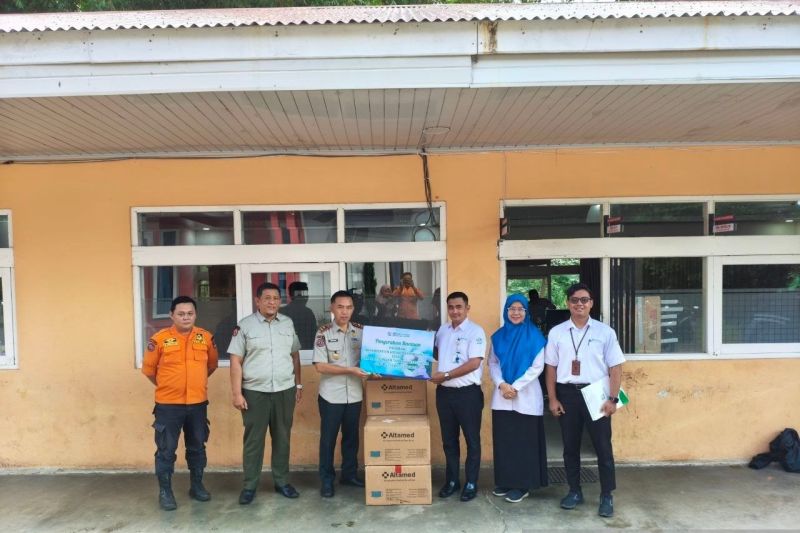 BPJS Kesehatan Bagikan 10 Ribu Masker untuk Masyarakat Bu...
